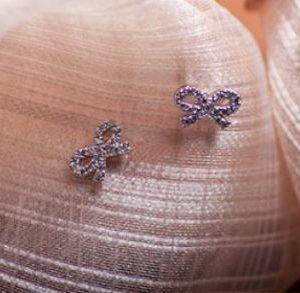 White Gold Bow Earrings with 0.12 CT Diamonds