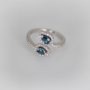 White Gold with 0.43 ct Center Blue enhanced Diamond and 0.45 ct natural Diamonds